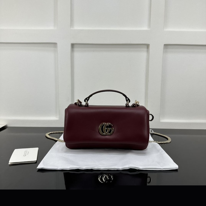 G*u*i top handle bags
